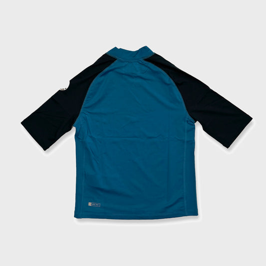 REMERA LYCRA RIP CURL SHOCKUPF BLUE